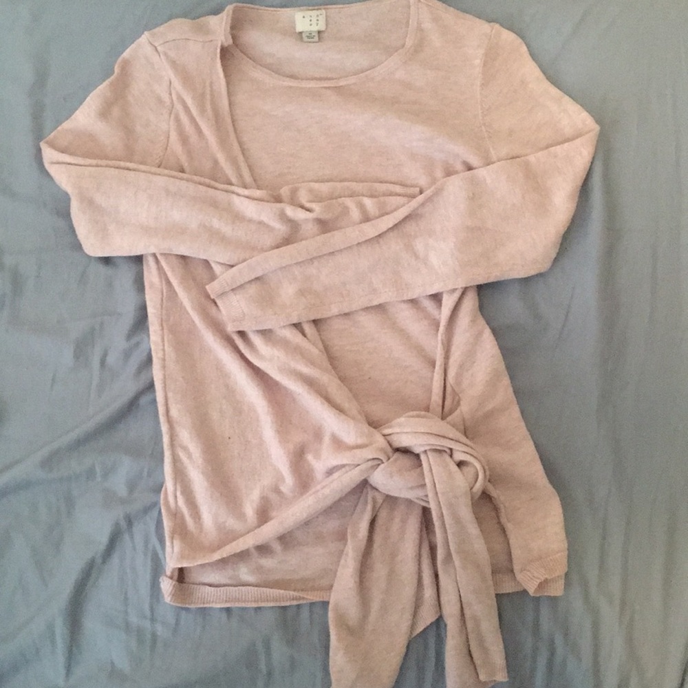 Pink tie cross sweater